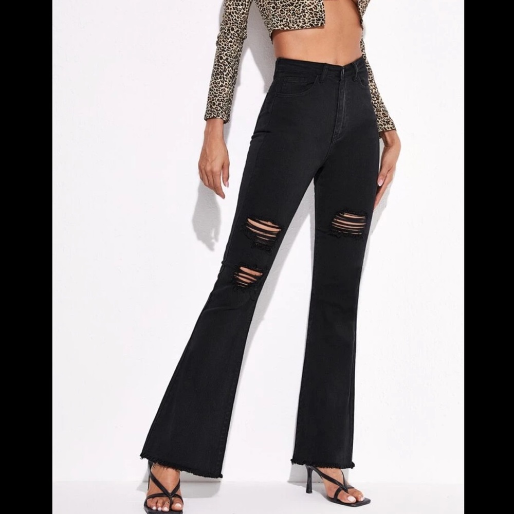 Black ripped flare jeans.